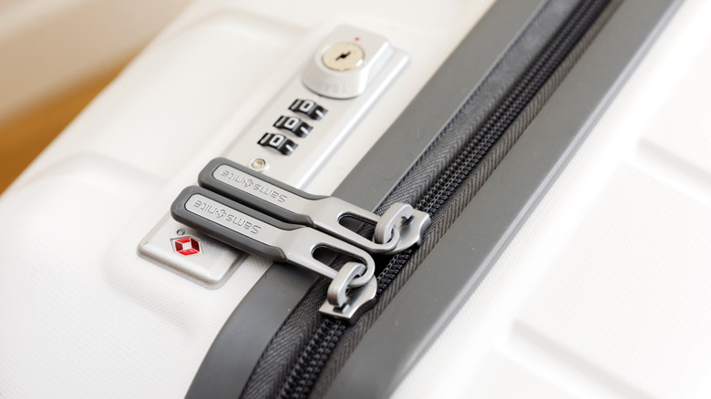 Close-up of TSA lock on a suitcase