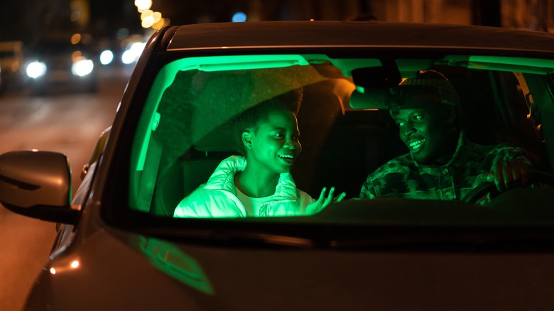 two people talking in car