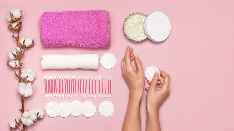 woman's arms showing hygienic products