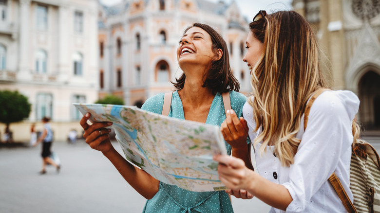 two women with map