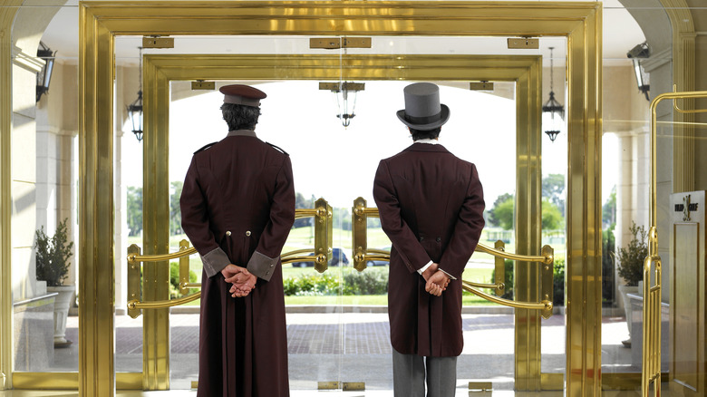 Door attendants at the entrance of hotel