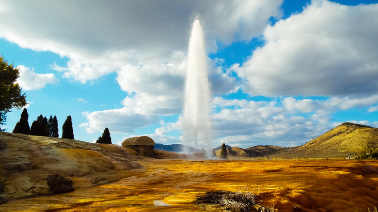 The Soda Springs Geyser shooting water into the air in Soda Springs, Idaho