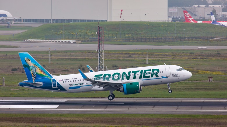 Frontier airlines flight taking off