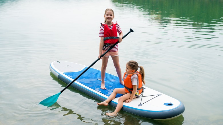 two Girls on paddle board