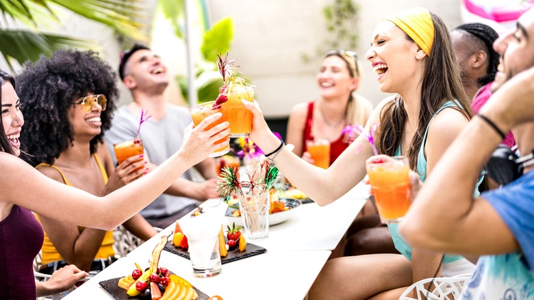 friends sharing drinks and meal