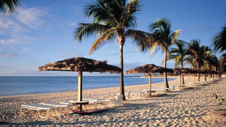 Jumby Bay beachfront with loungers