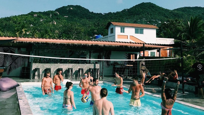 Friends playing volleyball