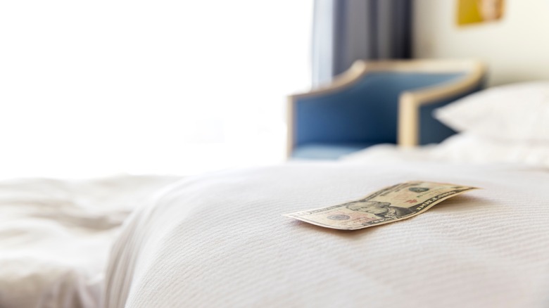 tip left on hotel bed