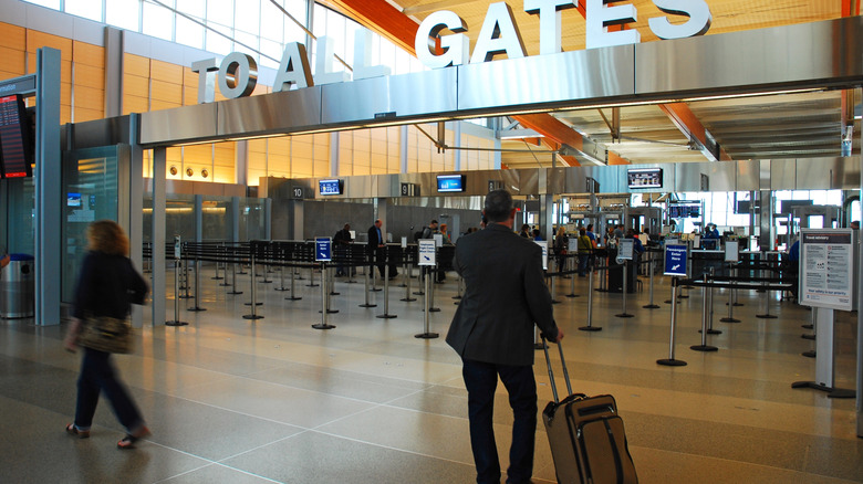 Traveler standing at TSA checkpoint