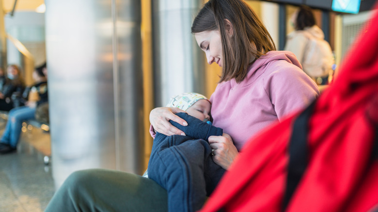 woman holding in airport