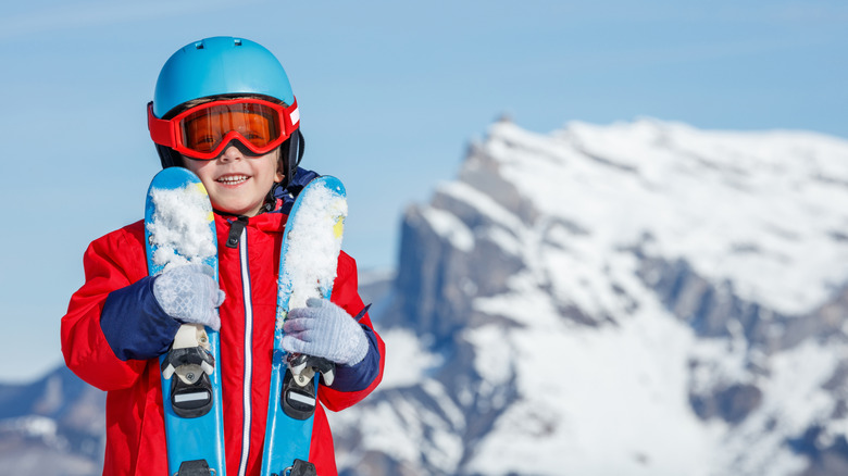 Young skier getting ready to hit the slopes