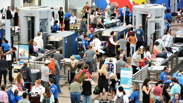 Busy airport security lines