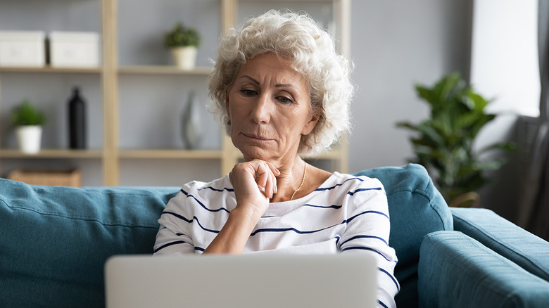 older woman looking at computer