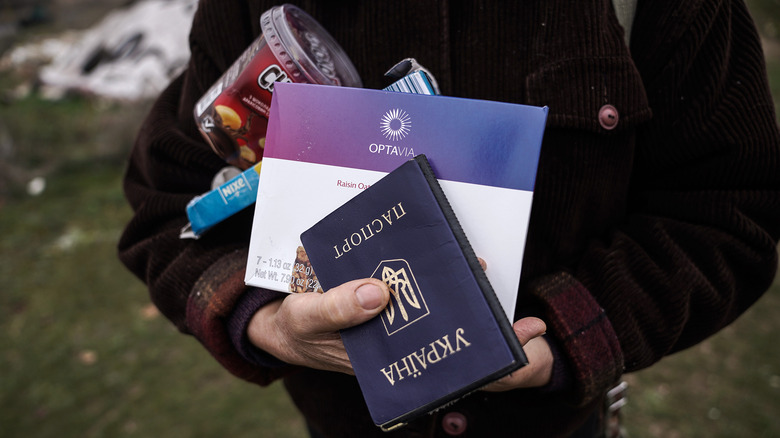 Person with Ukranian passport.