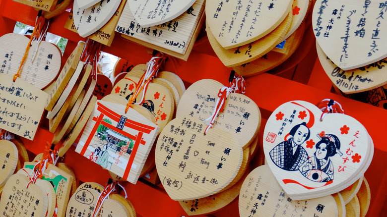 Ema wood blocks with wishes written on them