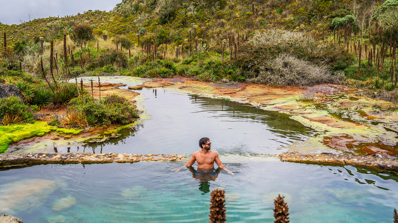 Man soaking in hot springs