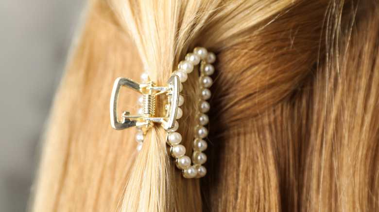 Claw hair clip in blonde hair