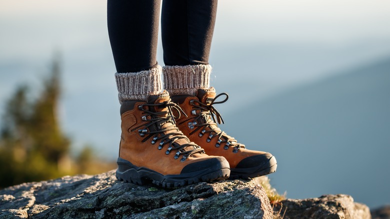 Someone wearing hiking boots