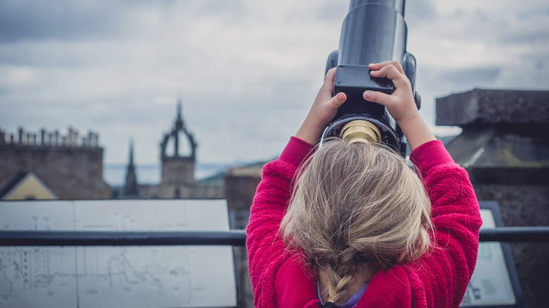 little girl overlooking Edinburgh 