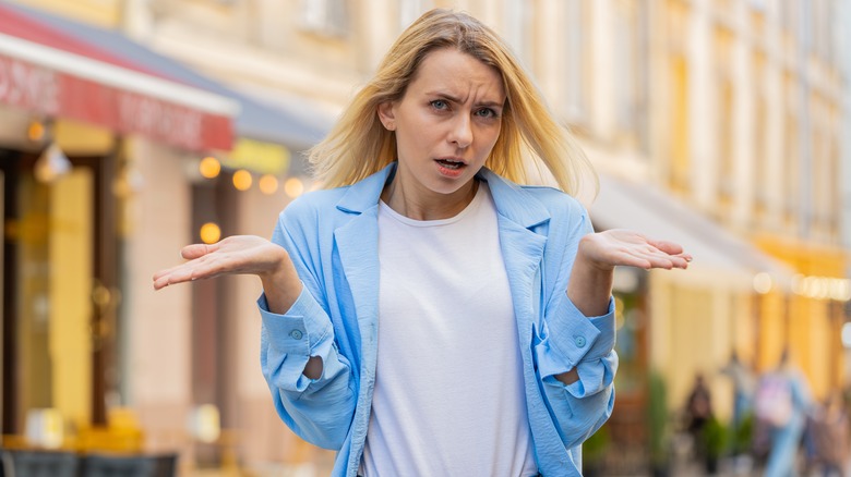 upset woman on European street