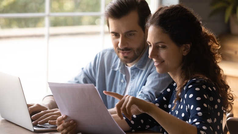 couple reviewing documents