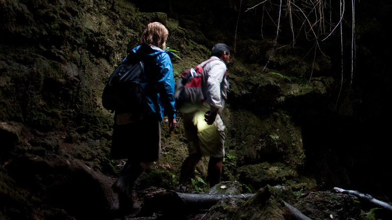 Tourists inside a lava tube