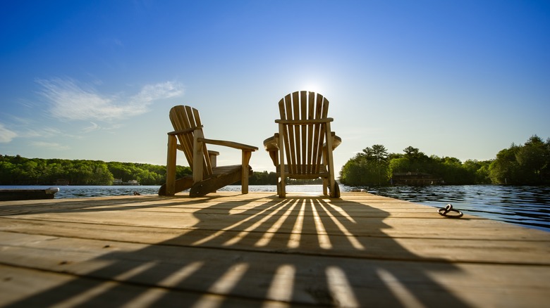 chairs on dock of lake