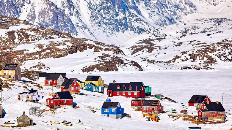 Colorful houses in snowy landscape