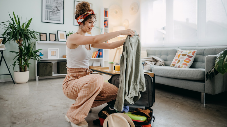 Woman packing bag