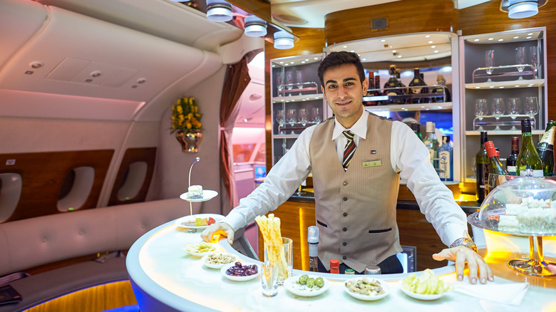 Emirates in-flight bar with bartender