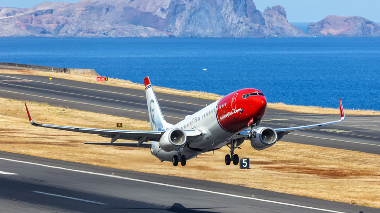 norwegian air airplane taking off
