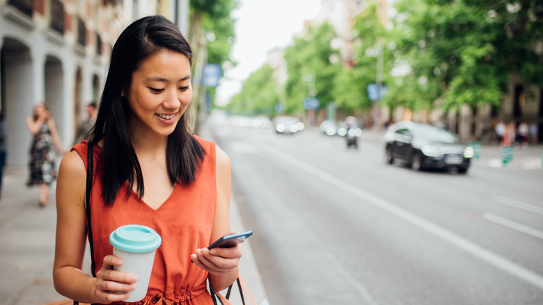 Female traveler using phone