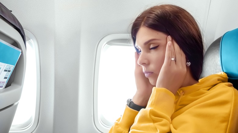 Plane passenger massaging head