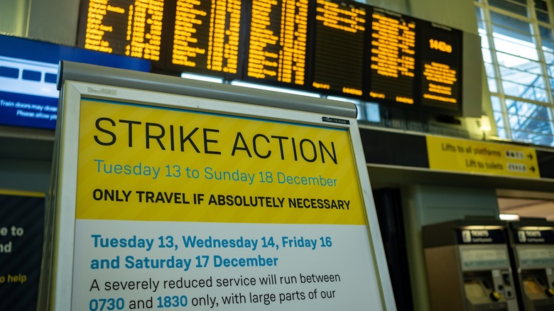 sign announcing strikes at train station