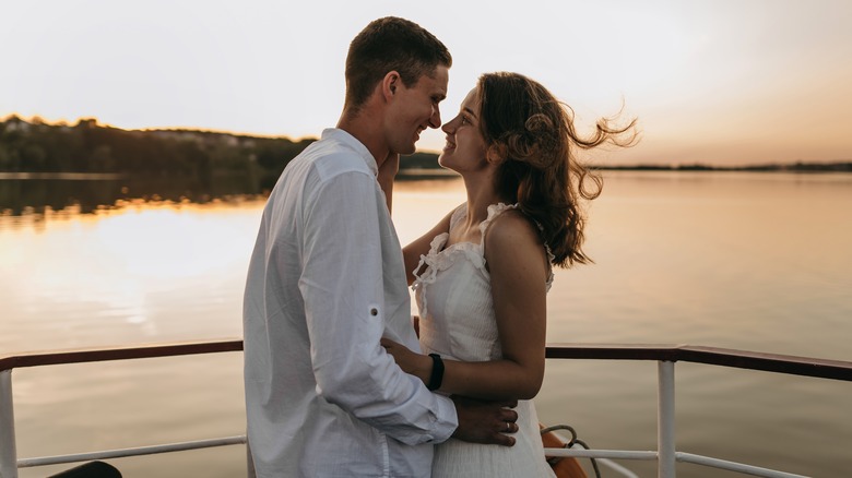 couple embracing on a boat