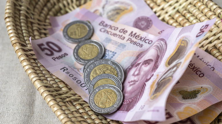 Mexican pesos in a basket