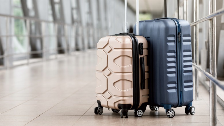 two suitcases in airport