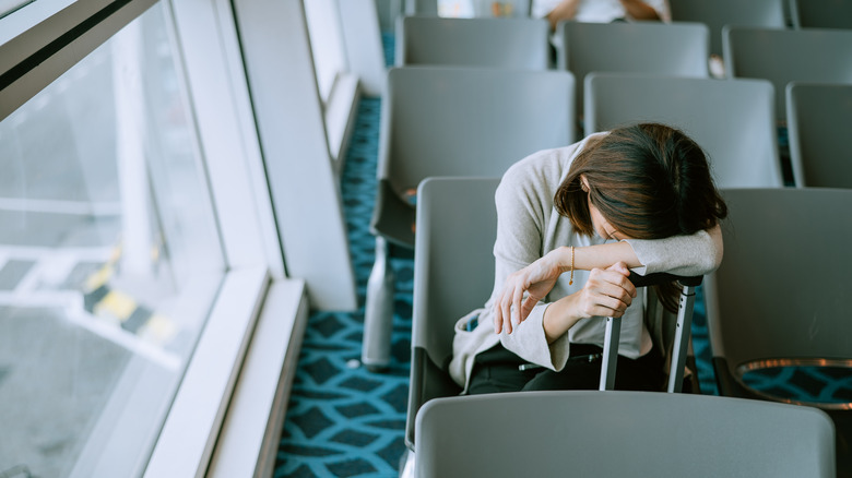 woman waiting at airport