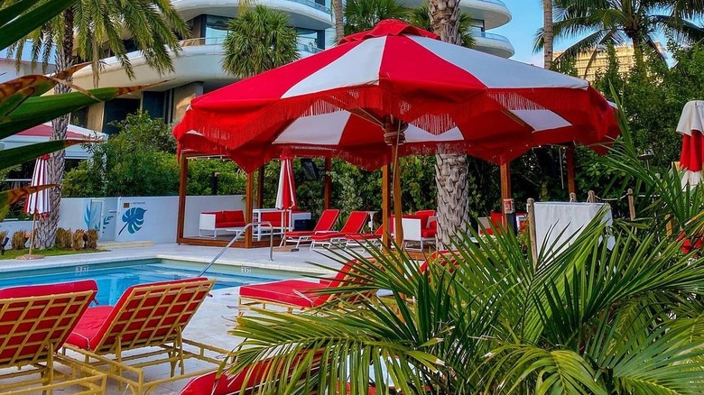 red and white cabanas by the pool