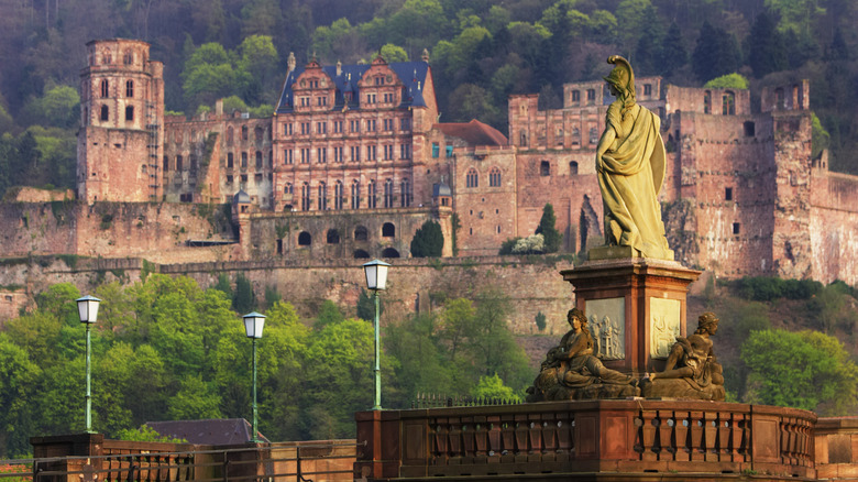Heidelberg Castle in the background and Athena statue in foreground