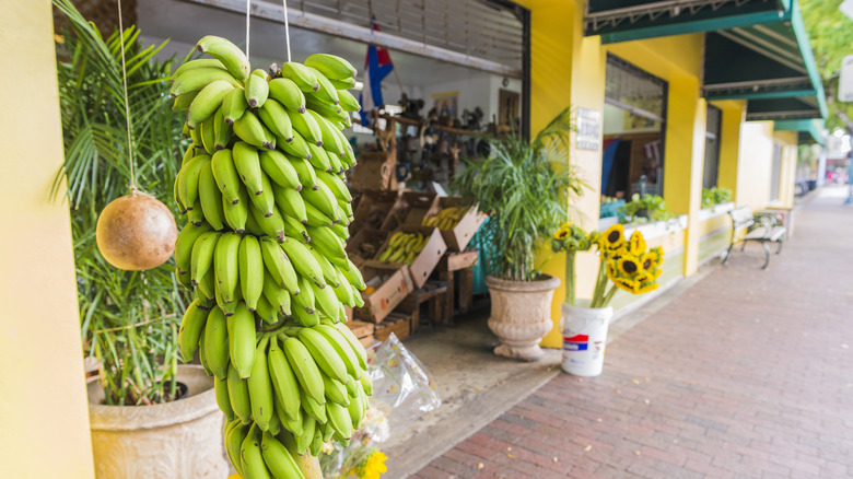 Bananas outside a shop