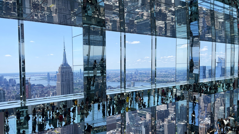 Reflecting mirrored room overlooking NYC skyline