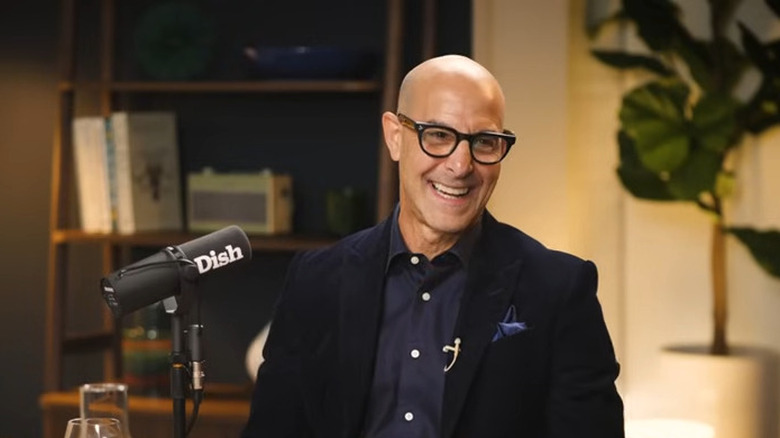 Stanley Tucci laughing during the "Dish" podcast.