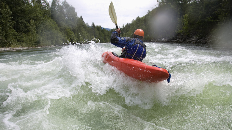 A river kayaker in whitewater