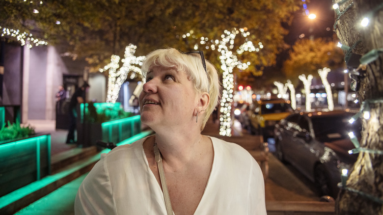 Traveler in downtown Austin at night