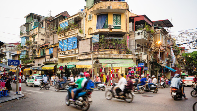 Vietnamese street filled with motorbikes