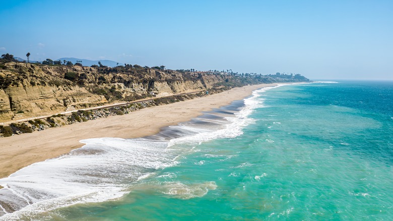 waves crashing beach