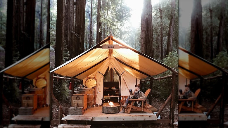 A woman in a glamping tent