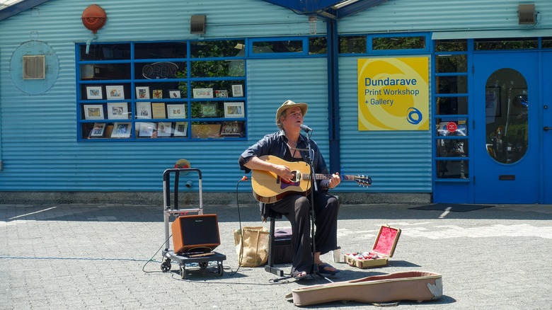 guitarists busking on Granville Island