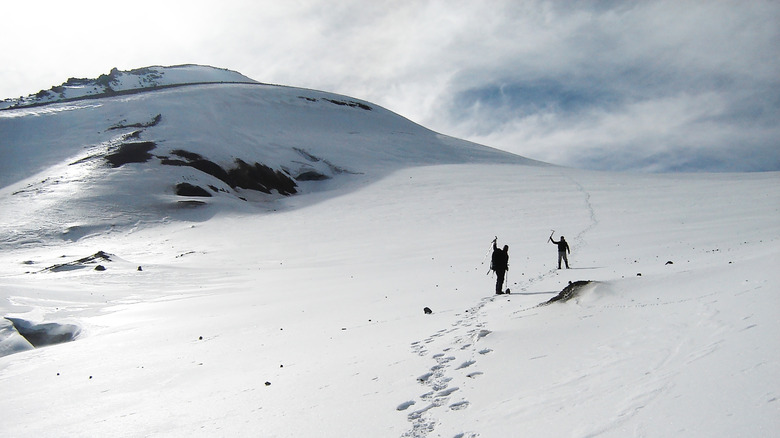 People climbing the Andes